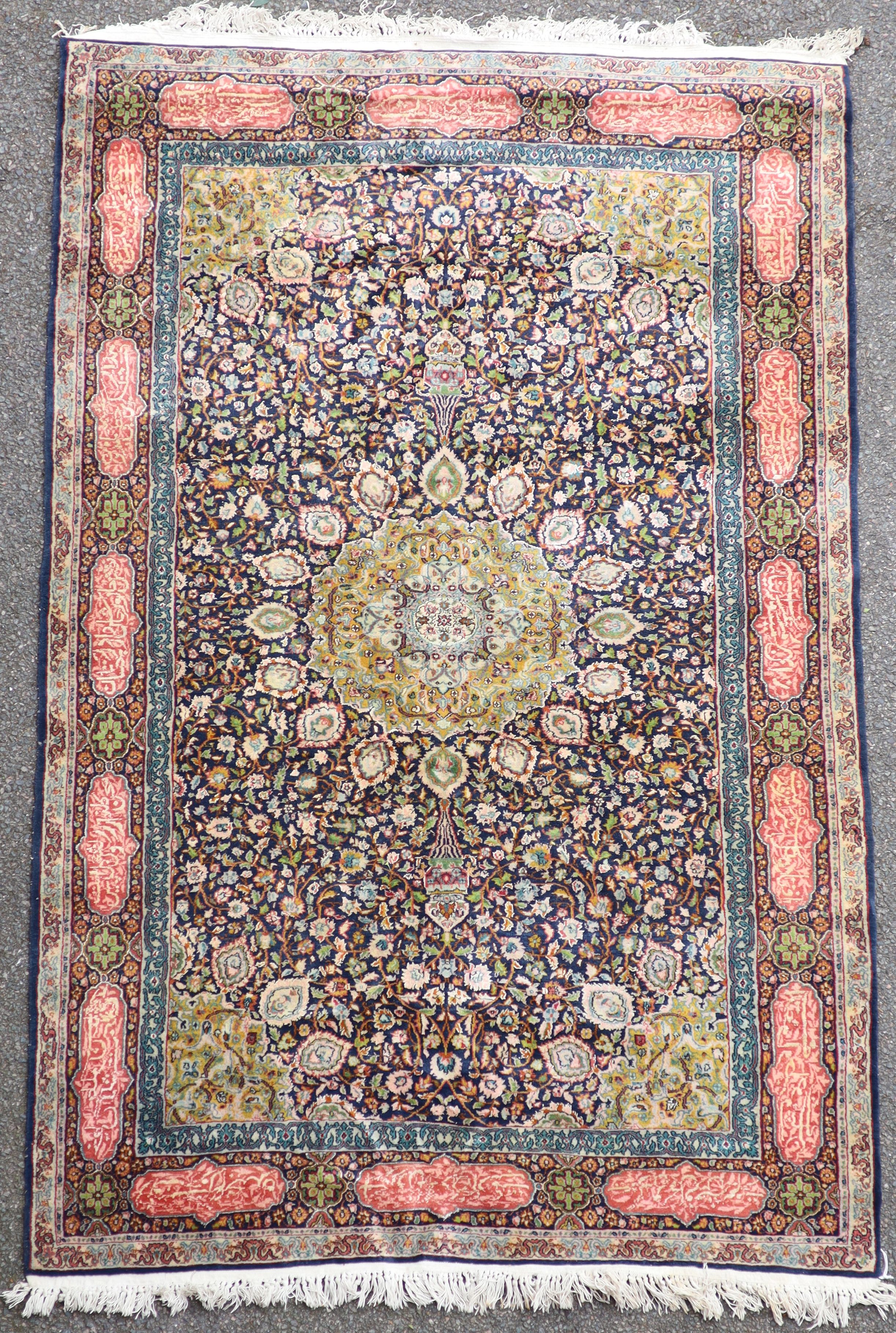 A Persian Kashan wool carpet 240 x 120cm